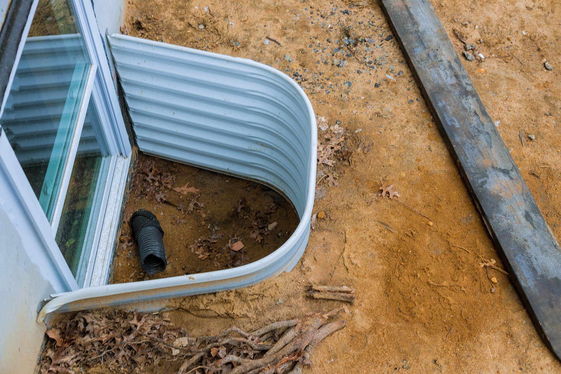 Severely damaged brick and concrete foundation with crumbling and exposed areas, highlighting the need for urgent foundation repair services in Ottawa, Gatineau, or Kingston.